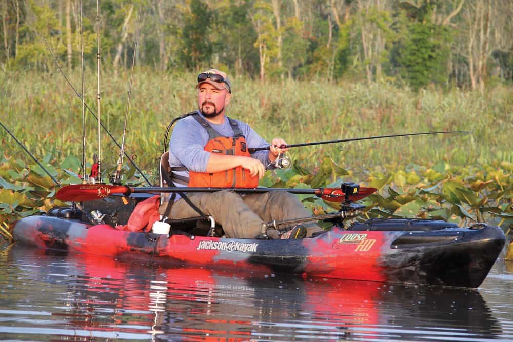   A well-equipped kayak provides John Leavitt the stealth to sneak into the cover where snakeheads lurk.  photos by David Hart 