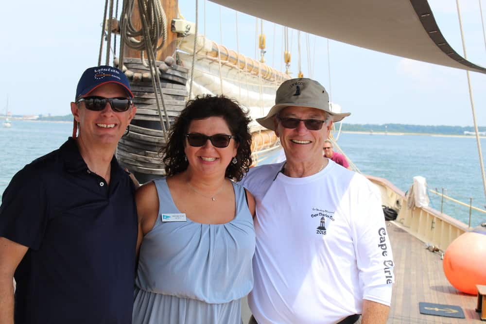  Leo Wardrup Memorial Cape Charles Cup committee members, from left, Ben and Christina Ritger and Bill Barnes pause for a photo while watching the race Saturday. Photo: Clara Vaughn 