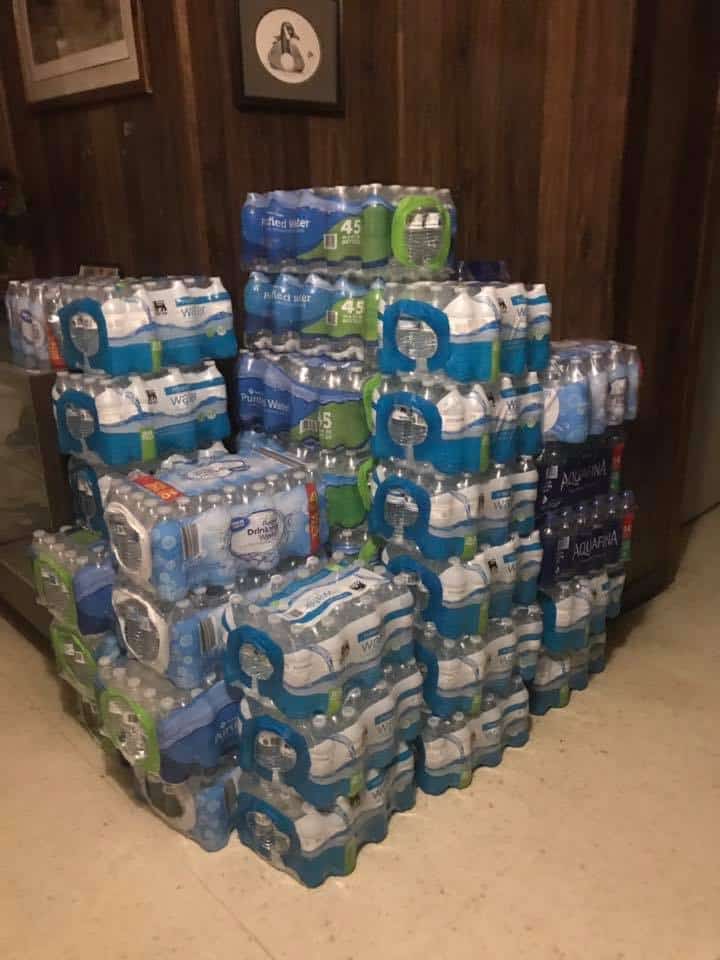  Cases of water collected by Chincoteague Elementary School students. Photo: Onancock Elks Lodge/Facebook 