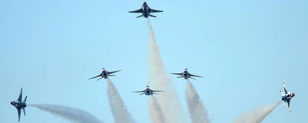  USAF Thunderbirds perform a delta burst. 