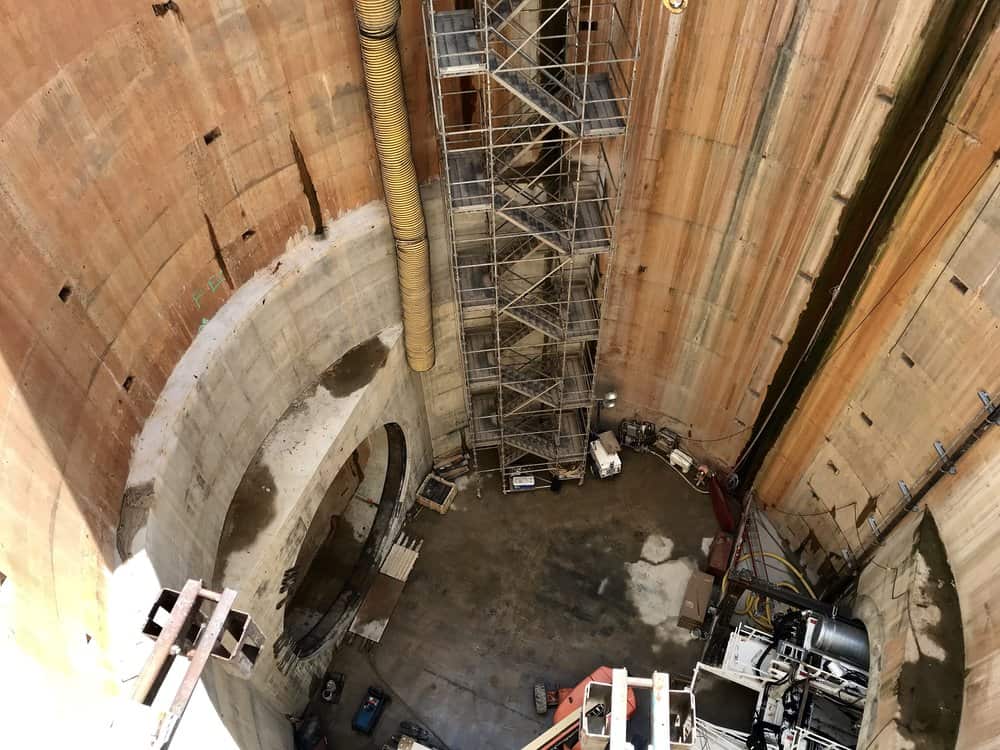   A peek into the 150-foot-deep hole where the machine will go. Photo: Natalie Jones 