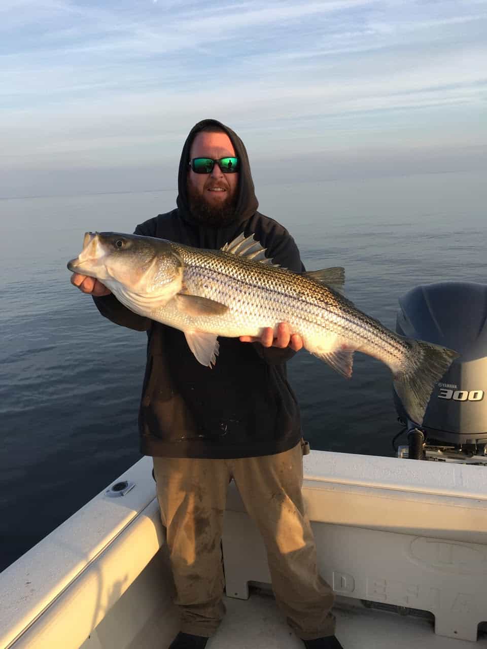  Fishing with Nick Fulford on Nick’s boat  Defiance , Chris Lankford, Seaford DE, jigged up this fine rockfish near Hooper's Straits on Sunday. (Photo courtesy of Nick Fulford)   