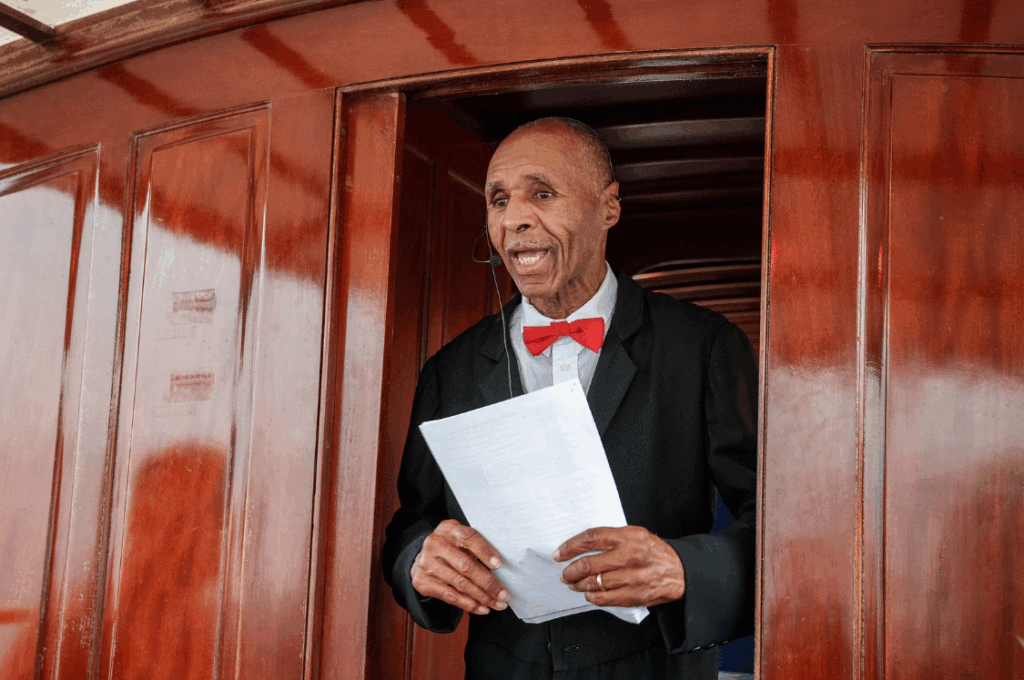 Nelson Polite, Jr., in the traditional dress of an Underground Railroad conductor